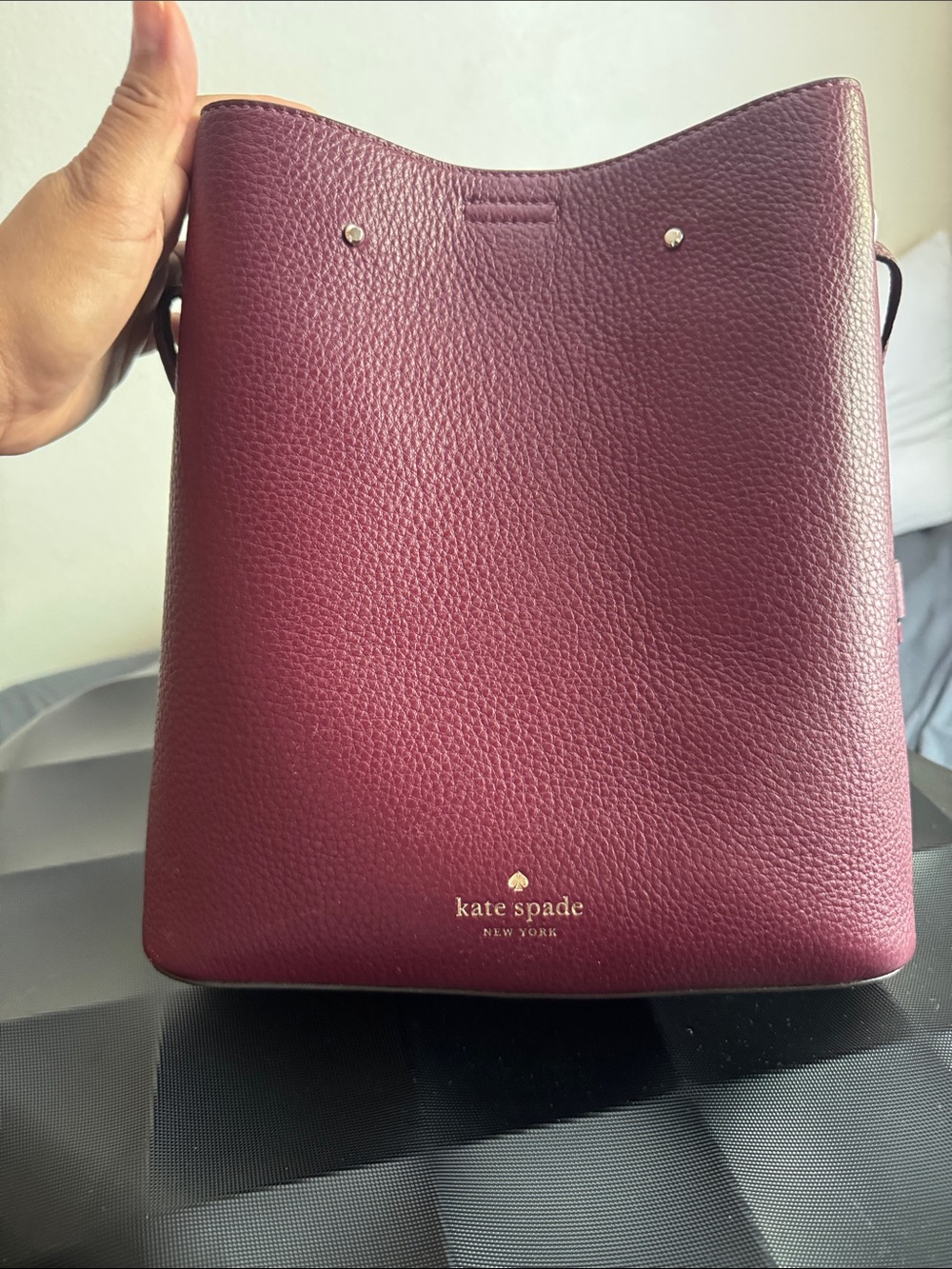 Kate Spade Marti Pebbled Leather Medium Bucket Bag in Deep Berry.